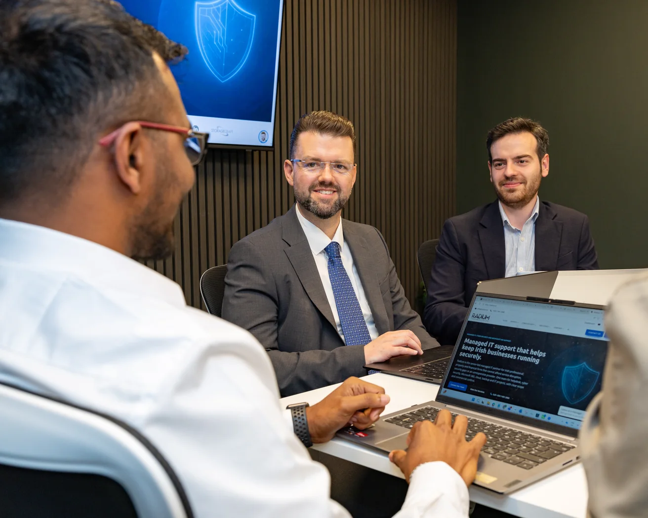 Stephen Galvin and Mert from Radium Technologies reviewing managed IT support in the Apex Business Centre meeting room