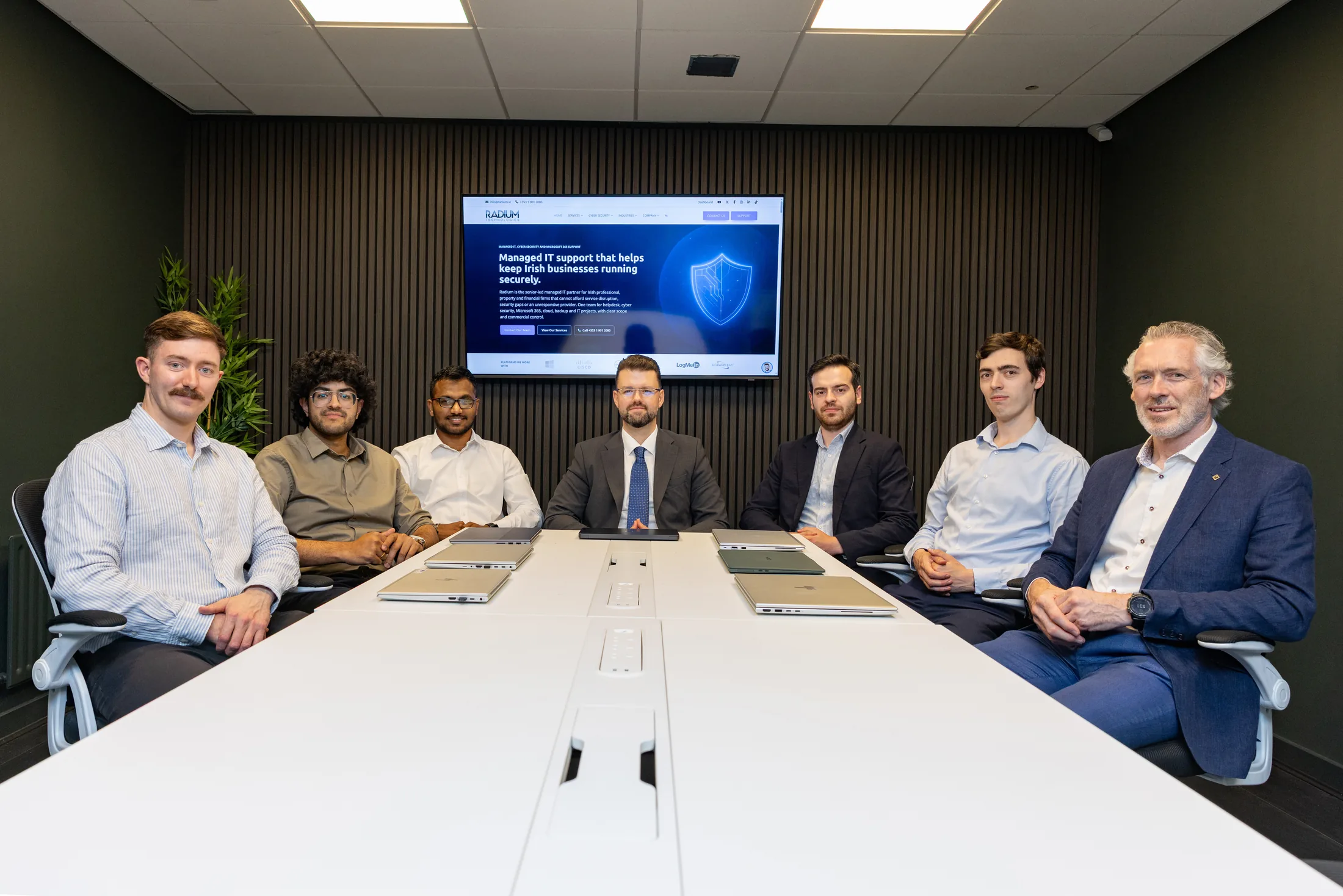 Radium Technologies IT and cyber security professionals in the Apex Business Centre meeting room
